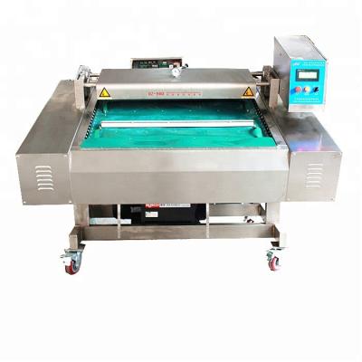 China Automatic Food Machine Vacuum Food Rolling Belt Vacuum Packing Machine Industrial Production Continuous Vacuum Packing Line for sale