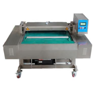 China Automatic Continuous Food Conveyor Rolling Belt Microcomputer Control Vacuum Packing Machine for sale