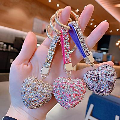 China Diamond Rhinestone Heart Shape 3D Auto Creative Car Wholesale Upholstery Bag Key Chain Pendant for sale