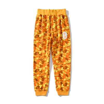 China Co-branded BAPE Anti-Static Eat Orange Chicken Camouflage Pants Student Male And Female Couples Suit Casual Pants Bundles Feet for sale