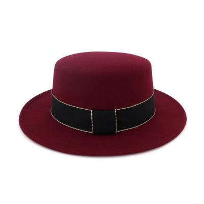 China 2021 New Style Character Wide Brim Solid Color Flat Surface Black Sliver Felt Fadora Hats For Women And Men for sale