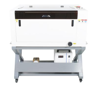 China American Best-selling 20/30/50 W Laser Source 4060 Deep CO2 Laser Marking Machine Acrylic Rubber Laser Marking Machine for sale