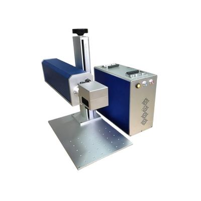 China Laser marking clothe cheap jeans towel co2 laser marker 60w 70w 100w laser marking machine with metal tube for sale