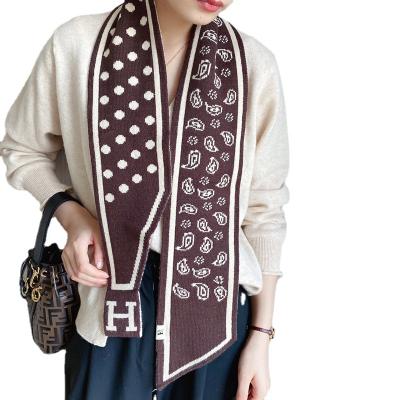 China Japanese and Korean style soft winter warm wear autumn and knitted scarf women stitching multi-color decorative printing scarf for sale