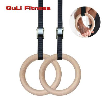 China Gym Safe Wooden Gymnastic Rings With Custom Logo Log Color Fitness Rings Adjustable Nylon Belt Suspension With Strap for sale