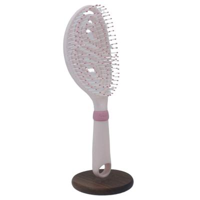 China Comfortable selling like hot cakes hollow environmental protection material silica gel hair massage comb for sale