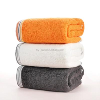 China Orange Dobby Canada Beach Towel Peri Bath Towels for sale