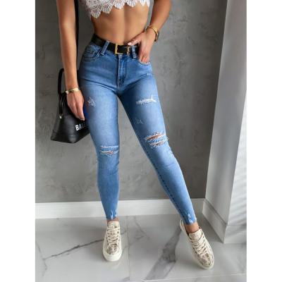 China Other Fashion New Arrival Autumn Winter Women Casual Street Holes Slim Fit Skinny Jeans for sale