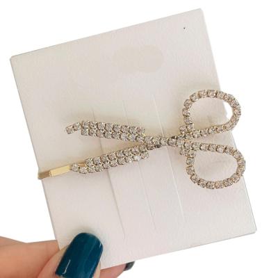 China Jewelrox Fashionable Alloy Crystal Hair Clips Scissors Shaped Elegant Hairpins For Women for sale