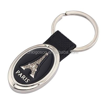 China Eco Friendly Wholesale Quality Paris Embossed Logo Custom Metal Leather Keychain for sale