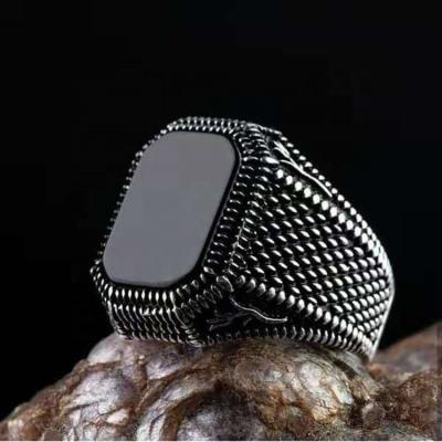 China Amazon new product punk idea personalized jewelry metal inlaid black gemstone fashion and generous men's ring for sale