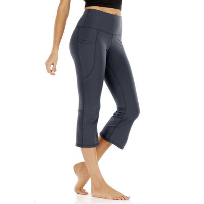 China QUICK DRY America Women Sports Loose Leisure Horn Yoga Suit Fitness Pants Yoga Tightly Pocket Seven Minute Pants for sale