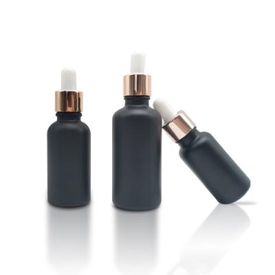 China Wholesale 30ml 50ml 100ml Environmental Friendly Empty Essential Oil Bottle Frosted Black Glass Dropper Bottle for sale