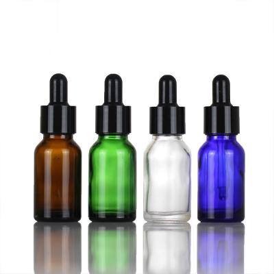 China Hot Selling Cosmetic Multiple Color 20ML 30ML 60ML 100ML Round Essential Oil Glass Bottle With Dropper for sale