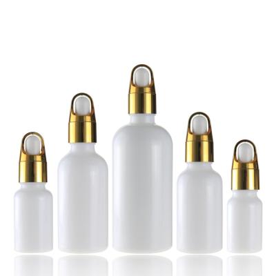 China Essential Oil 5ml 10ml 30ml 50ml 100ml Cosmetic Luxury Empty White Porcelain Shiny Glass Dropper Bottle With Pipette Gold Screw Lid for sale