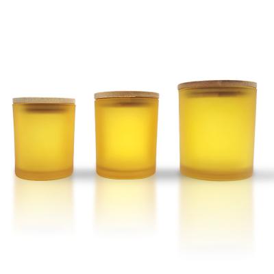 China Household Products Wholesale 7oz 10oz 14oz Empty Colorful Candle Jars Luxury Glass Candle Jars With Lids for sale