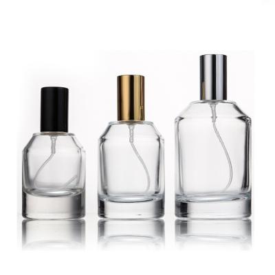 China Wholesale 30ml 50ml 100ml Environmental Friendly Empty Cylinder Glass Perfume Bottle With Spray Cap for sale