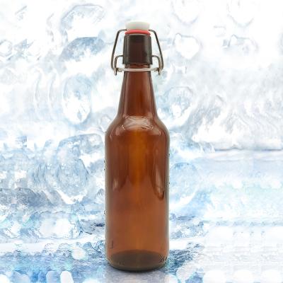 China 350ml 500ml 750ml 1000ml Custom Round Empty Environmental Friendly Amber Glass Beer Bottles With Swing Tops for sale