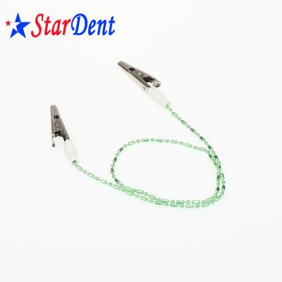 China Plastic Dental Bendable Bib Holder Clips With Adjustable Plastic Chains for sale