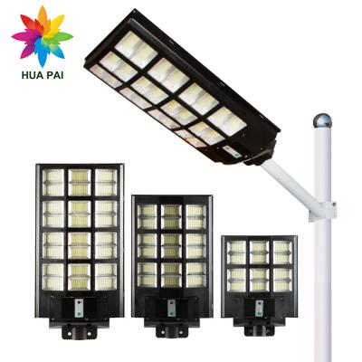 China ROAD HUAPAI 1200W Solar LED Radar Induction Light Control 600 900 ABS Street Light All In One Street Light for sale