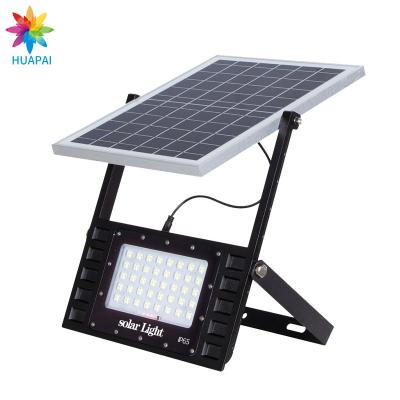 China HUAPAI Theme Park China Factory Ip65 50W 100W 150W 200W Waterproof Outdoor Wall Mounted Solar Flood Light for sale