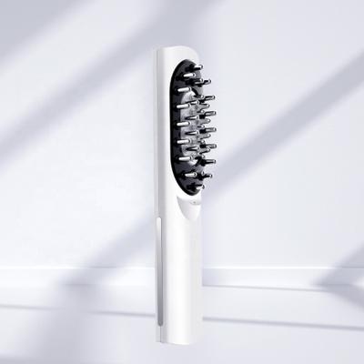 China ABS Plastic Handle Portable Scalp Massager Comb with Negative Ion and Micro Current for sale