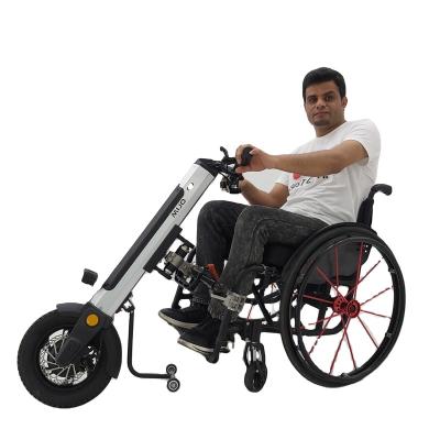 China 2021hot sale 12 inch unisex electric handbike 350w handcycle 36v electric handbike attach wheelchair for the elderly for sale