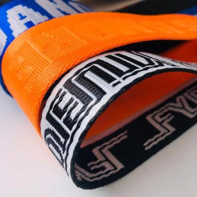 China High tenacity custom design 3d logo jacquard strap ties polyester webbing strap for sandals for sale