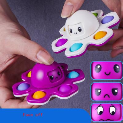 China Children's toys A001 Flip Spinning Smile Sun Flower double-sided Toy Rotate Reversible Push Change face fidgety person octopus spinner for sale