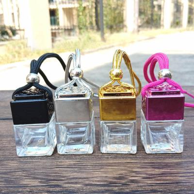 China Household Products AA7-1827 8ML Car Perfume Bottle Cavity Perfume Ornament Hanging Air Freshener For Essential Oils Diffuser Perfume Glass Bottle for sale