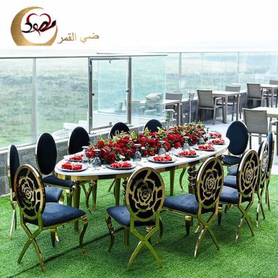 China Customize Dining Room Sets Oval Shape Top Tempered Mirrored Glass Wedding Table for sale