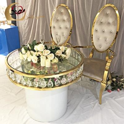 China Customized Modern Elegant Metal Frame Gold Style Design Cheap Round Glass Dining Table for sale