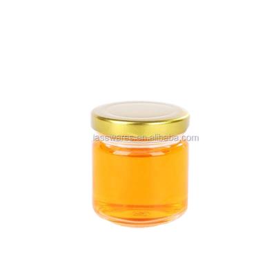 China 25ml 35ml 50ml small sealed empty glass jam honey jar with gloden lid for sale