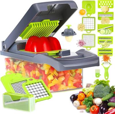 China Viable Hot Selling 12 in 1 Vegetable Food Fruit Onion Potato Peeler Slicer Cutter Vegetable Manual Cleaver for sale