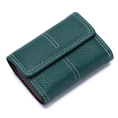 China Whip New Mini Ladies Small Genuine Leather Women Wallets Coin Purse Credit Card Holders For Woman for sale