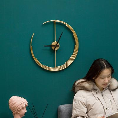 China Gold Antique Luxury Metal Handmade Morden Scandinavian Minimalist Home Style Moonstring Wall Clock Art Decor for sale