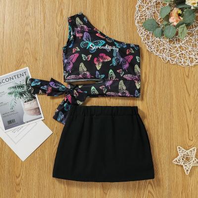 China 2022ins style children's clothing preppy European and American one-shoulder hollow bow fashion upper two-piece skirt to customize for sale