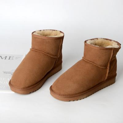 China Winter Anti-slippery women's boots short fashion sheepskin and wool snowboots bargain price snow boots winter leather boots for sale