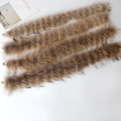 China Factory Direct Supply Luxury Real Raccoon Fur Trim For Hood Detachable Raccoon Fur Collars Raccoon Dog Hair Ribbon Clothing Burrs for sale