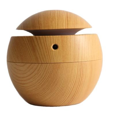 China Factory Price Wooden Grain Mushroom Grain Mini Round Shape Bamboo Plug In Diffusers Mist Air Humidifier for sale