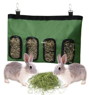 China Durable Cloth Bag Hanging Feed Bag 4 Holes Hay Feeder Bag Hanging Feeding Supply For Small Animals Bunny Rabbit Guinea Pig Hamster for sale