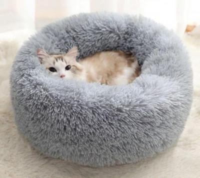 China Fluffy Round Self Plush Donut Cushion Soothing Soft Heating Pet Cat Bed For Small Dog Kitten for sale