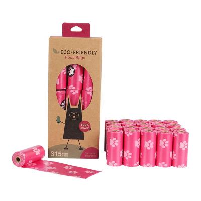 China Eco Friendly Plant Based Paw Pattern Disposable Dog Poop Stocked Bags Biodegr Pink for sale