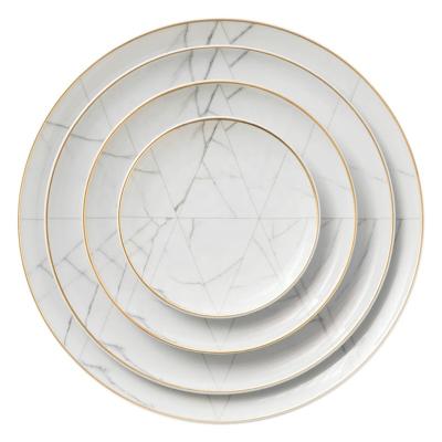 China Viable Popular Bone China Fine Dinner Set With Gold Rim White Marble Decal Ceramic Dinnerware Set for sale