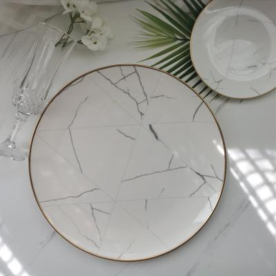 China Viable Wholesale China Wedding Supply Decal Gold Rim Charger Plates White Marble Charger Plates for sale