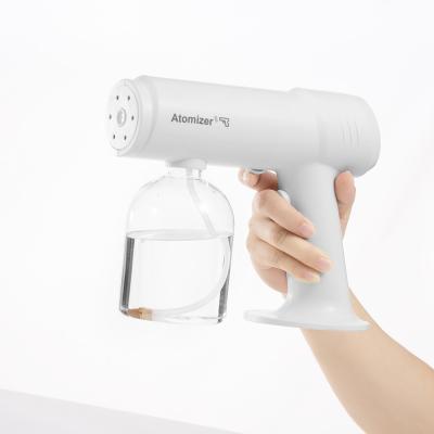 China Plastic Rechargeable Wireless Disinfect Sprayer Mini Nano Spray Gun with Blue Light for sale