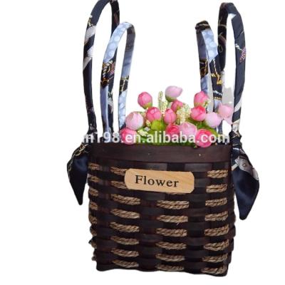 China Sustainable Fashionable Hand Weaving Decorative Wooden Flower Hanging Baskets for sale