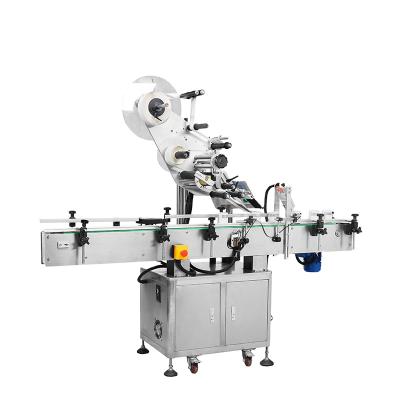 China MT-200 High Speed ​​Automatic Food Round Bottle Vertical Dry Adhesive Labeling Machine For Wine Bottle for sale