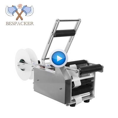 China Bespacker MT-50 Wine Labeling Machine APPAREL Semi Automatic Round Paper Bottle Sticker for PET Bottles Boxes for sale