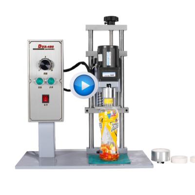 China Semi-automatic CLOTHING bottle screw capping machine for plastic screw platypus glass cap for sale